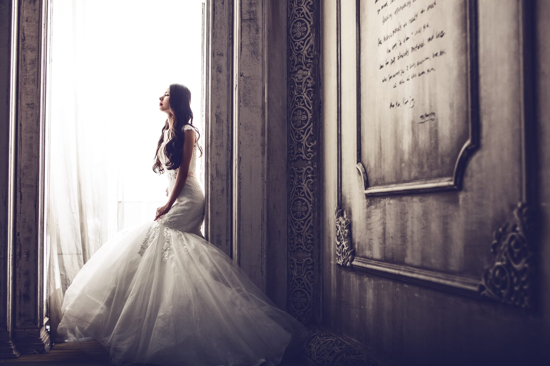 Rustic Wedding Bride Rustic Wedding Bride sitting in a large window of an old building