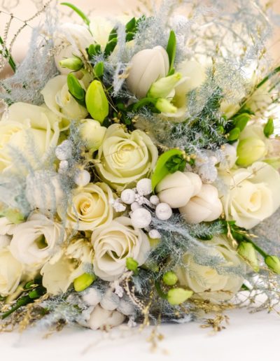 Romantic and Elegant Wedding all white flower bouquet on table