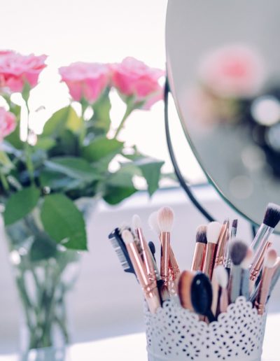 Wedding makeup brushes on table