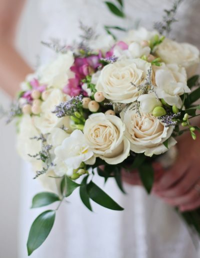 Romantic and Elegant Wedding Bouquet held by bride at classic wedding