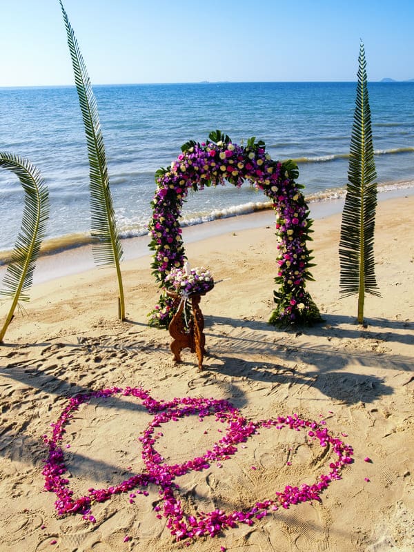 Marbella Weddings Flower arrangements on a beach in Marbella for a wedding
